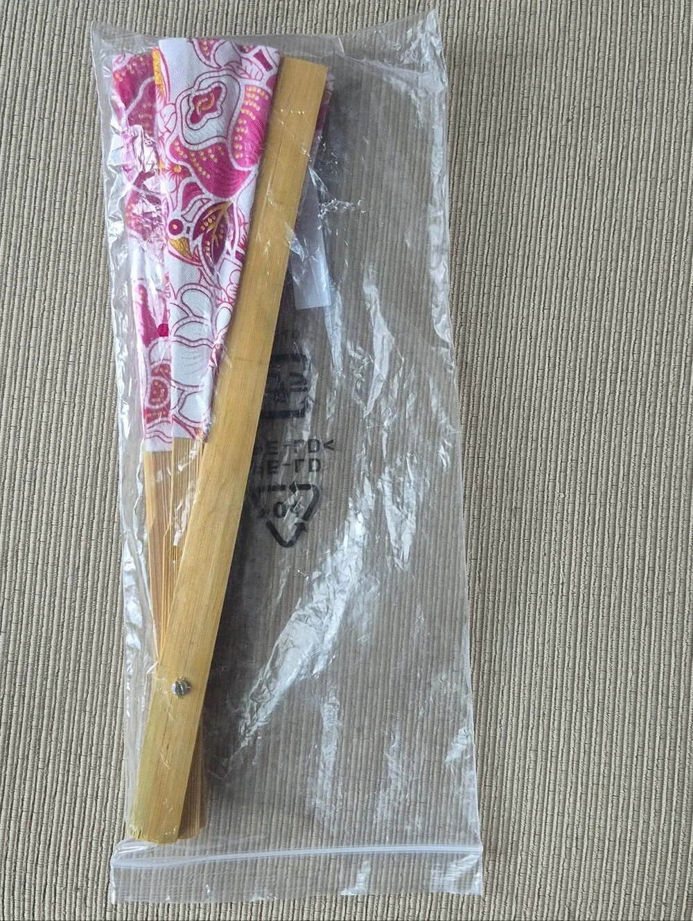 Thai folding fan with a floral fabric pattern on a bamboo frame,home decor
